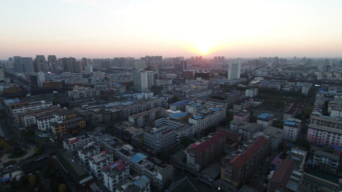 许昌夕阳下城市建筑街道空镜航拍