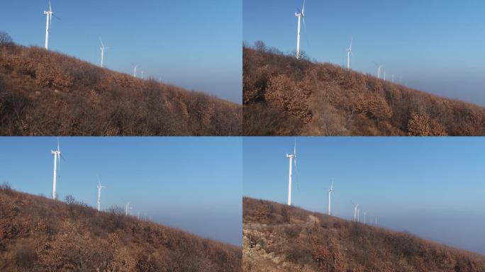 神垕镇山上一排环保风车空镜航拍