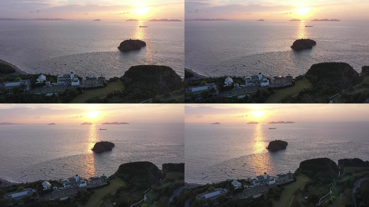 大连棒棰岛会议中心滨海海岸清晨日出逆光
