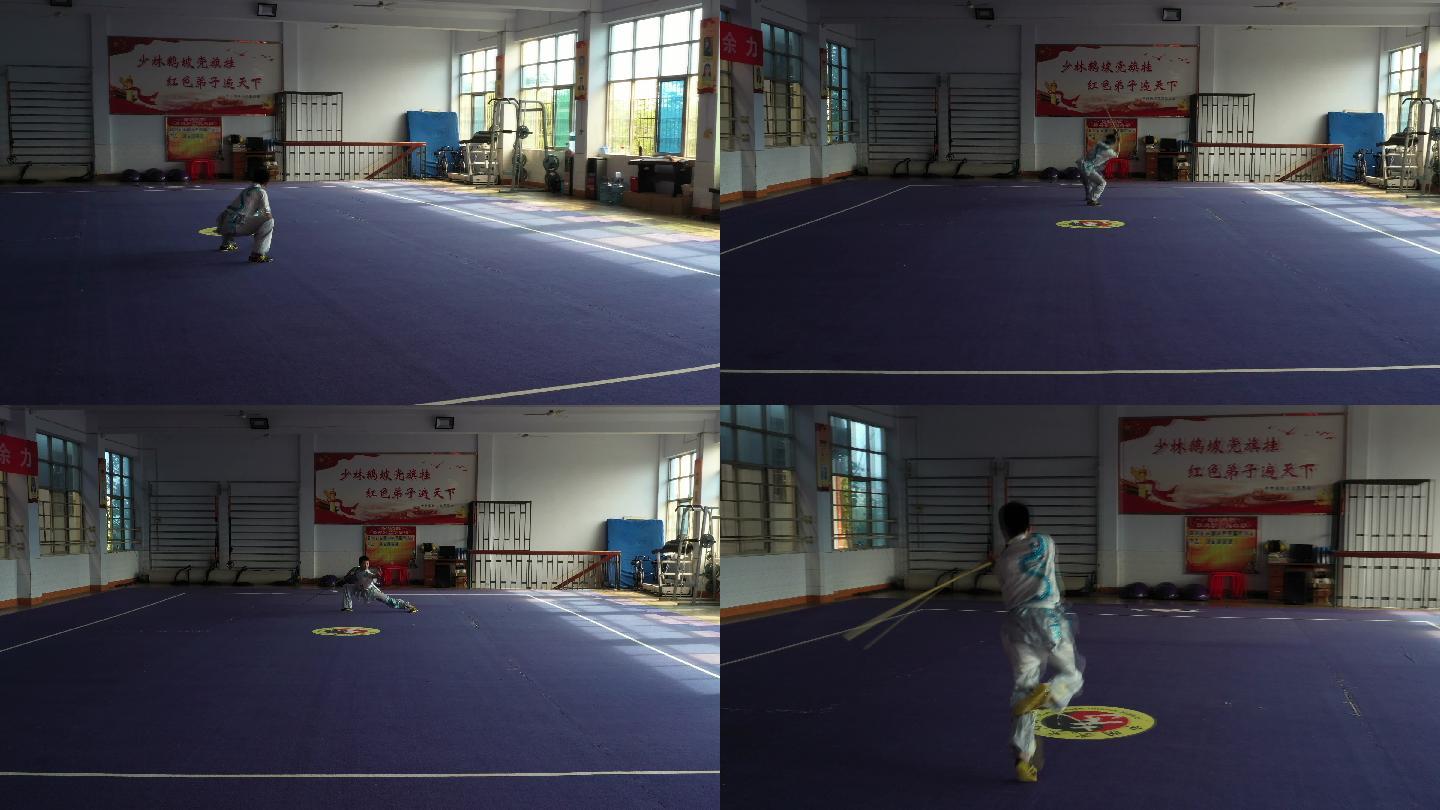 少林鹅坡武术专修院教室中学生练武耍棍棒