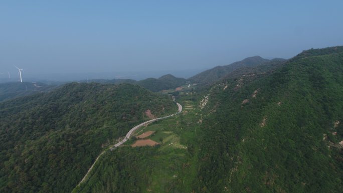 航拍蓝天下的大山山峰