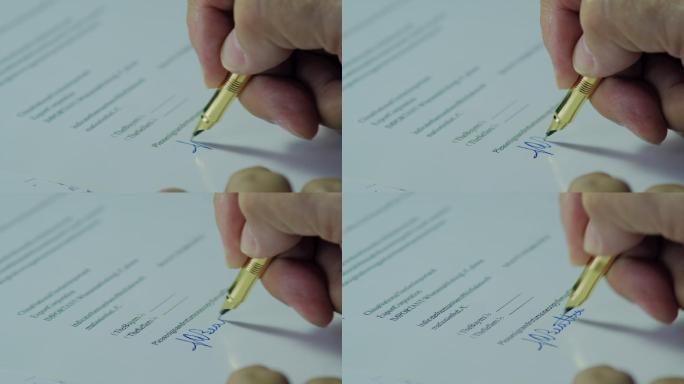用外文在合同上签字的特写