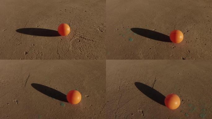 阳光水泥地面乒乓球和影子