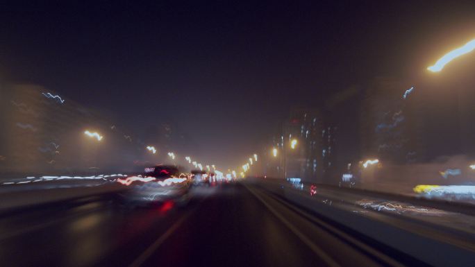 夜晚车辆在城市里穿梭 夜景北京车流线