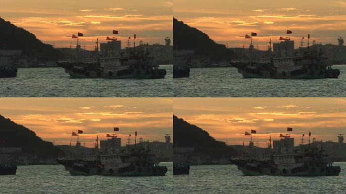日落海上渔船