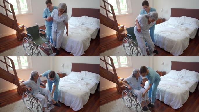 医护人员帮助老年妇女坐在轮椅上