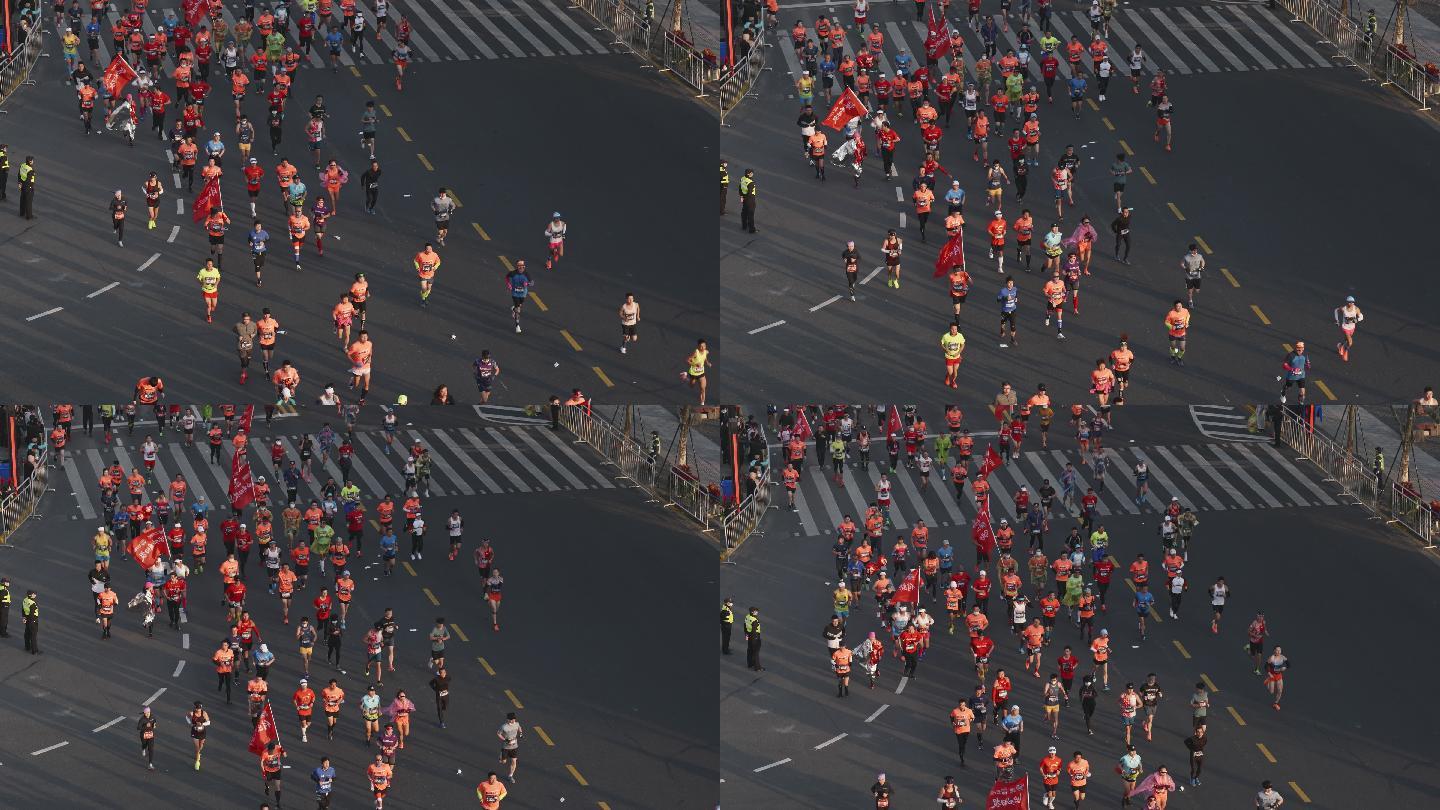 上海马拉松大批参赛选手经过中山东一路外滩