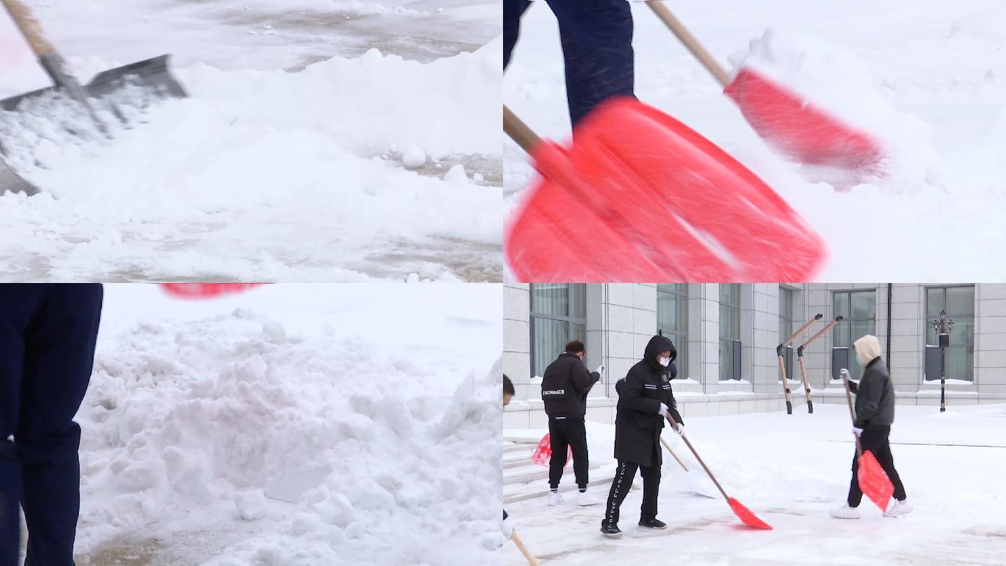 物业人员员工铲雪清理院内积雪