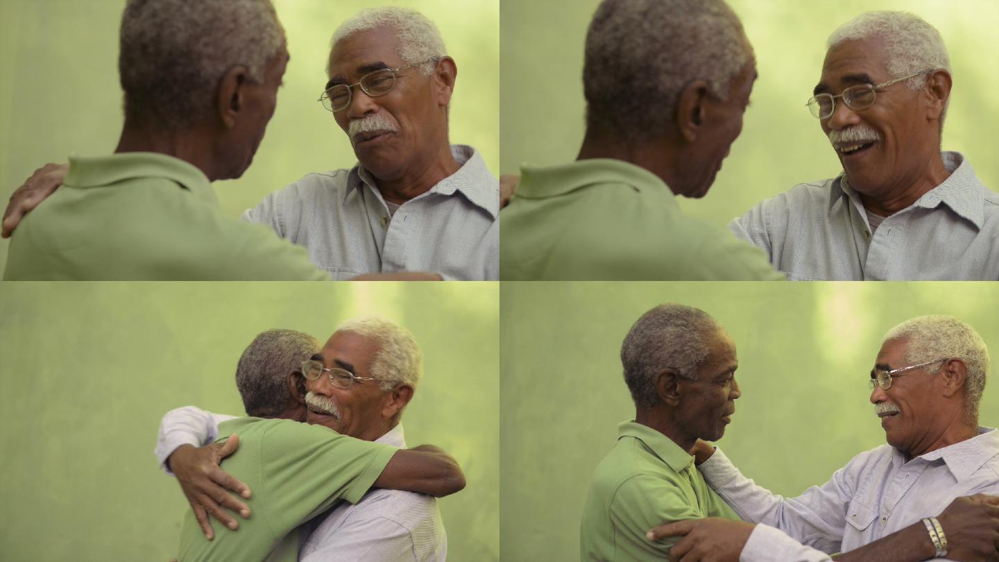 两位非裔美国人见面并拥抱