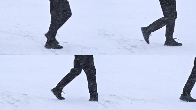 雪中行走的行人脚步