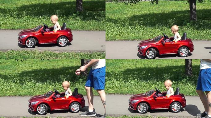 小男孩正在骑一辆由父亲驾驶的玩具车