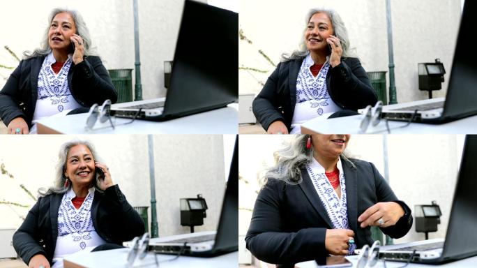 女人在咖啡馆使用笔记本电脑