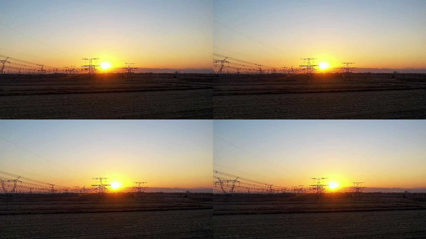高压电塔清晨日出航拍高清视频