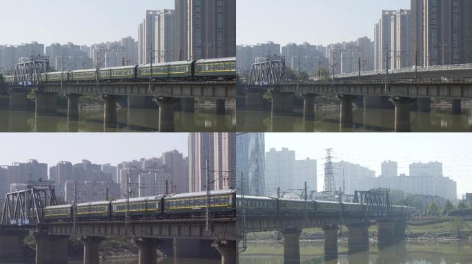 城市铁路桥绿皮火车行驶视频素材4K