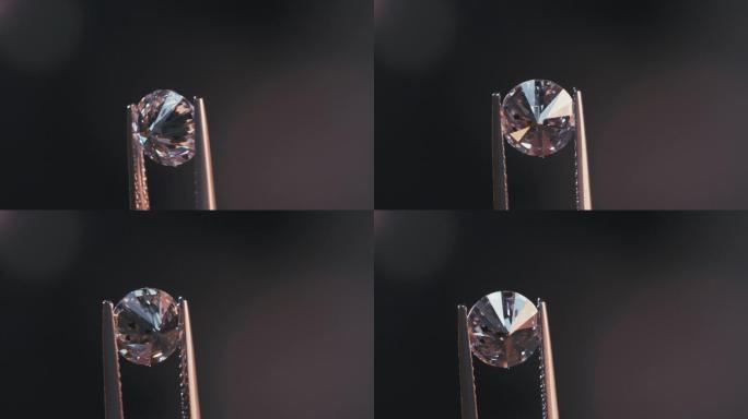 一位宝石学家正在检查一颗大而透明的钻石