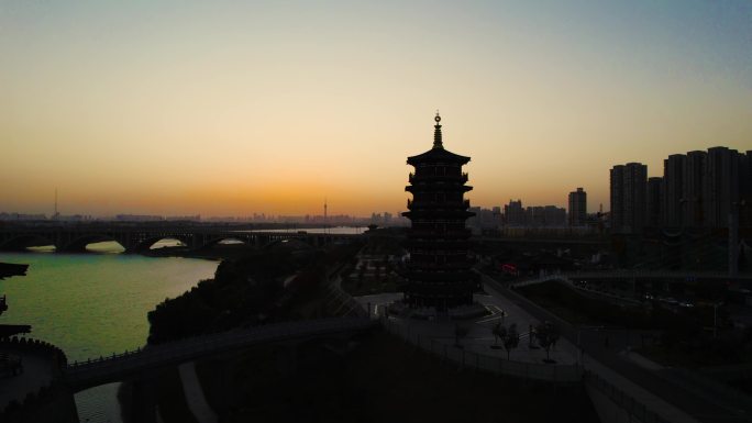 瀍河瀍壑朱樱塔古建筑夕阳晚霞剪影逆光航拍