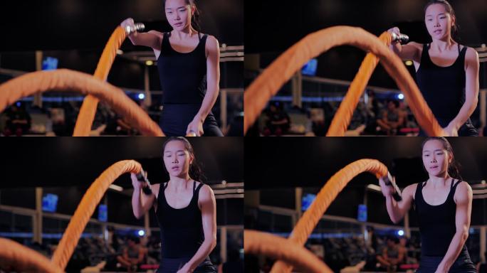 女子训练搏击绳减肥瘦身室内锻炼中国女性