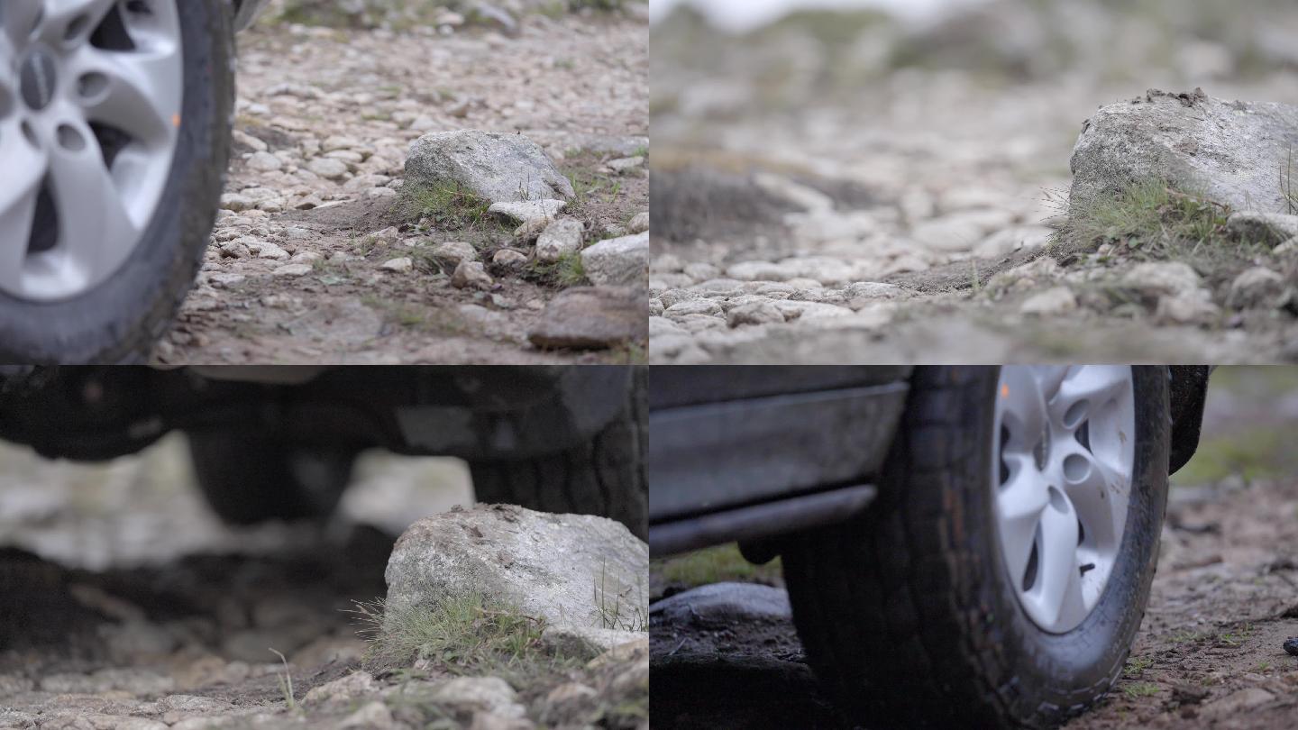 汽车轮胎压过石头