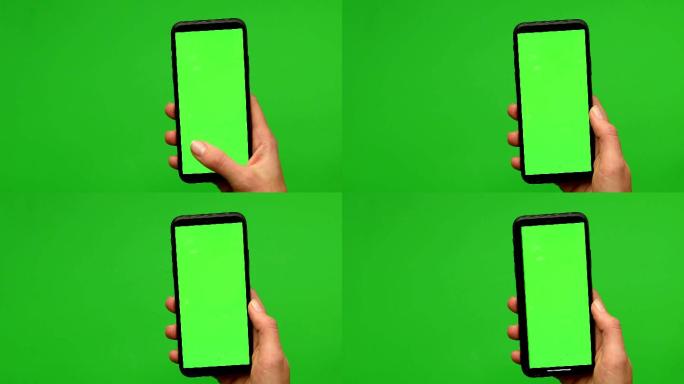 女士手持一部绿色屏幕的智能手机