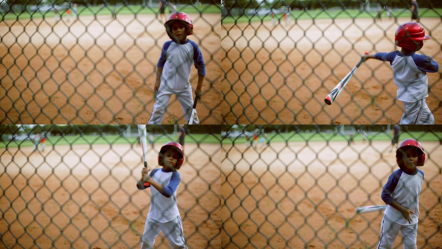 练习打棒球的小男孩