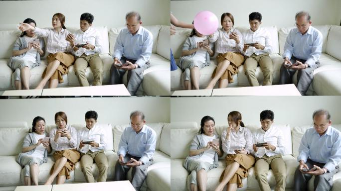 一家人在家上网一家人在家玩手机