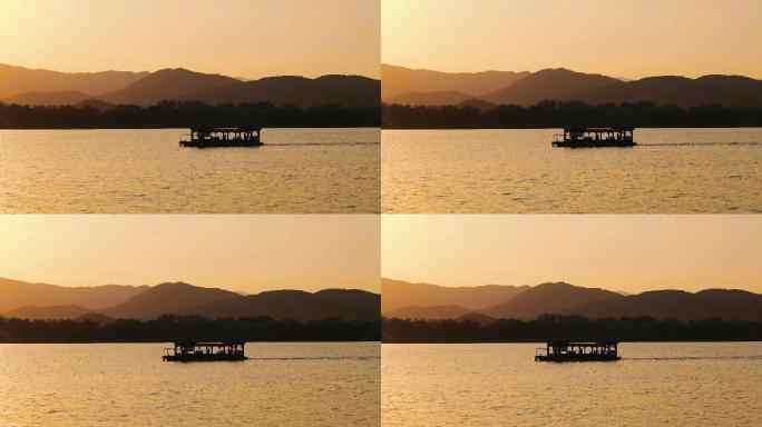 黄昏日落湖面上的船
