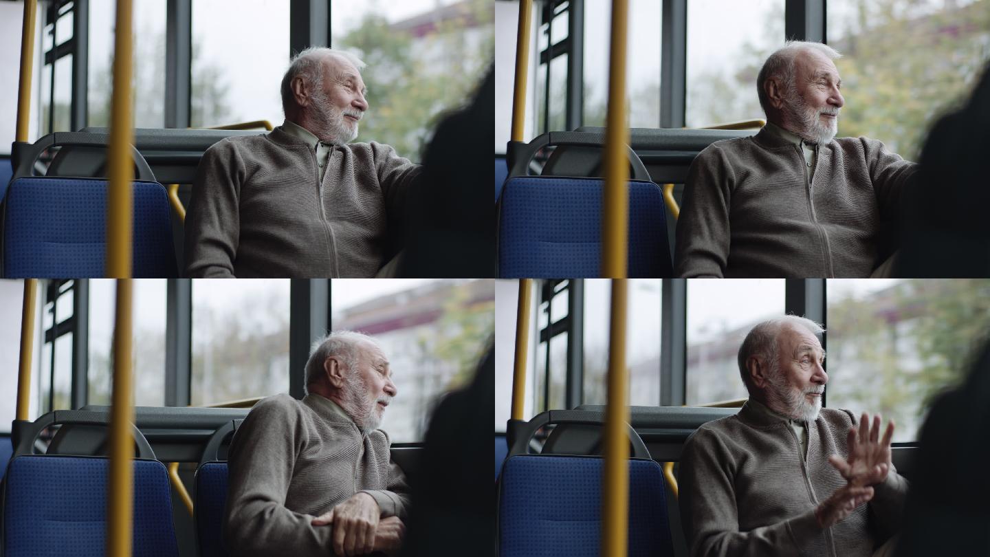 坐在公共汽车上微笑的老人