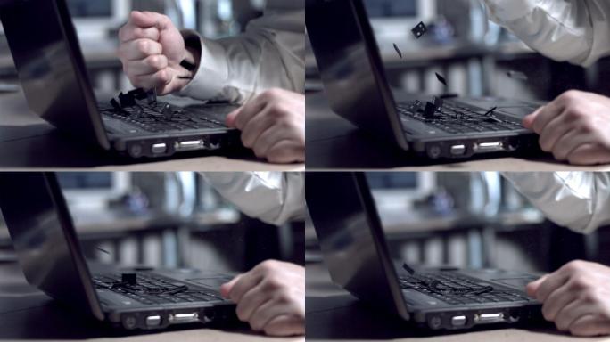 商人用拳头砸笔记本电脑