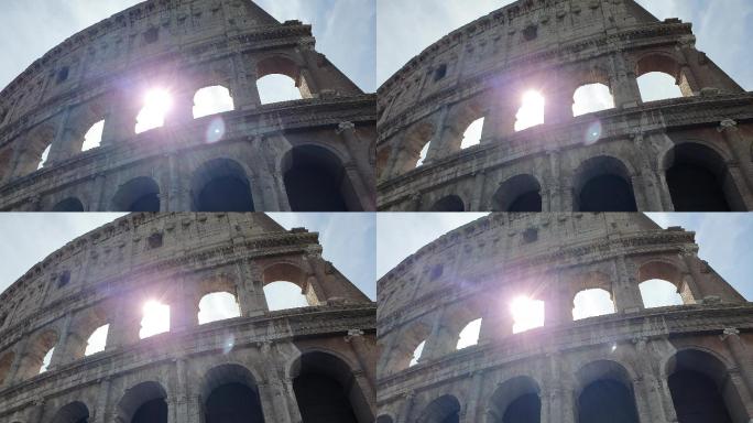 一缕阳光穿过意大利罗马斗兽场的拱门。