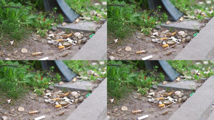 公园地板的垃圾灰烬垃圾桶污染