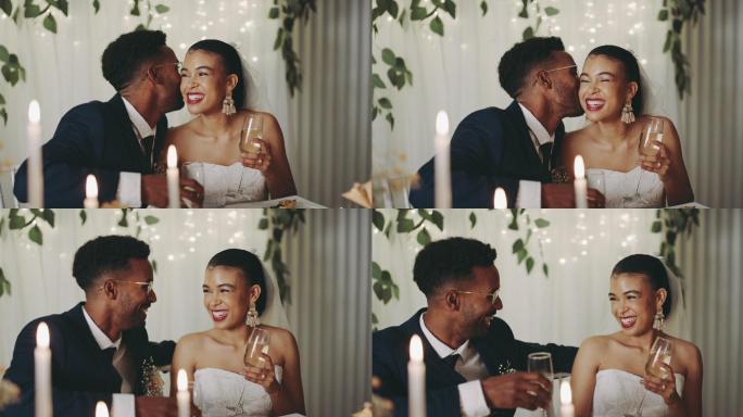 年轻夫妇在婚宴上坐在一起喝香槟