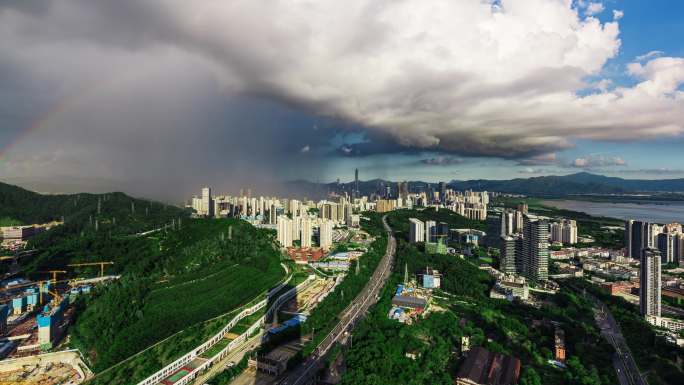 4k延时深圳市区雨后彩虹蓝天白云