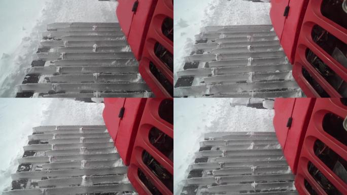 雪车的特写镜头，梳理雪山滑雪坡
