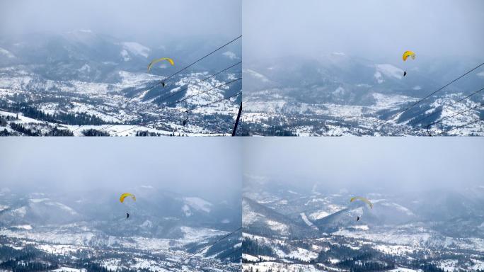 滑雪者在滑雪胜地上空滑翔