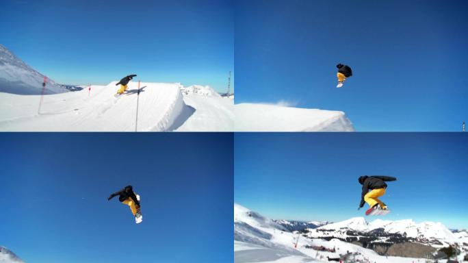 滑雪板运动员在滑雪场跳跃
