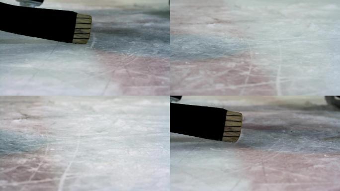 冰球棒在冰上的特写镜头