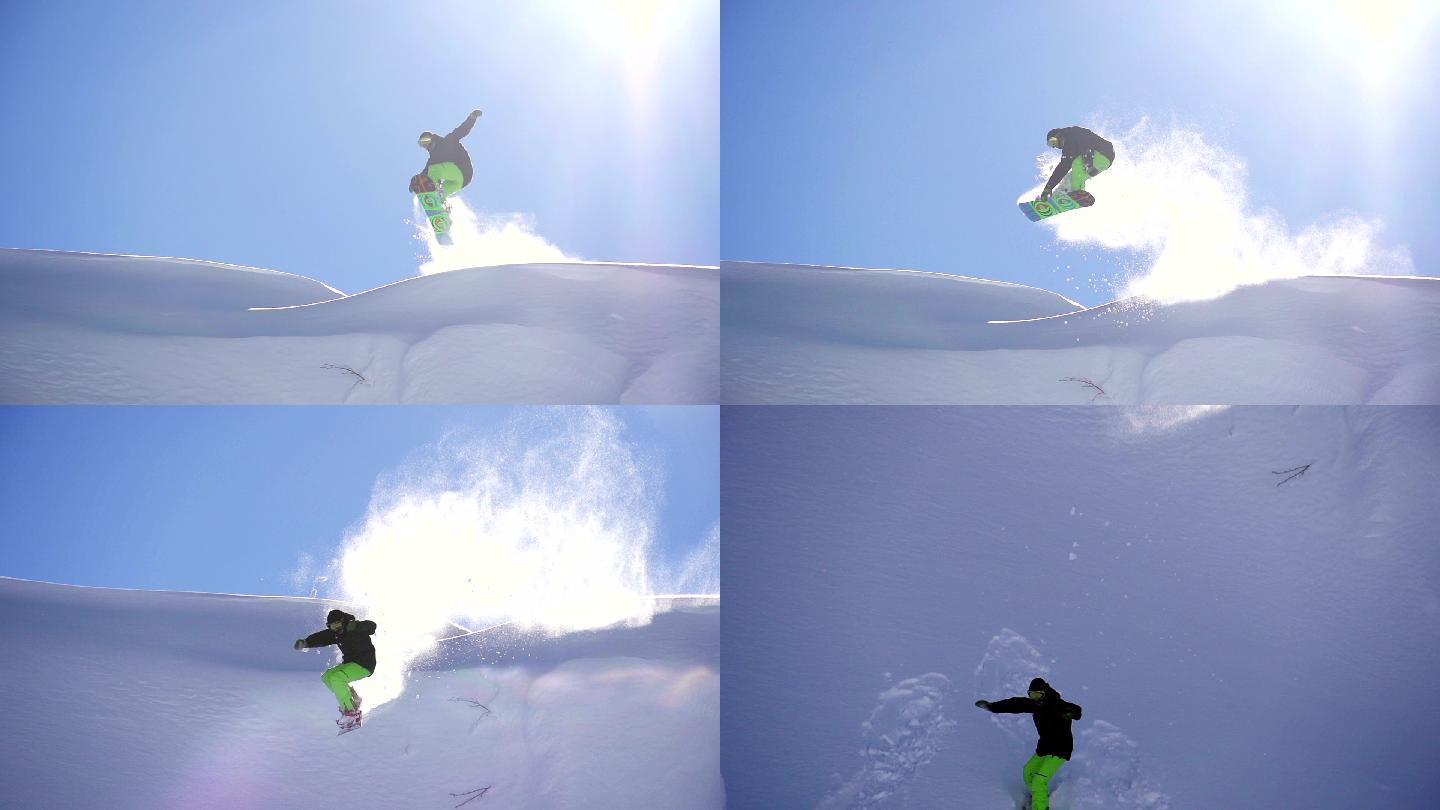 滑雪运动员从悬崖上跳下。
