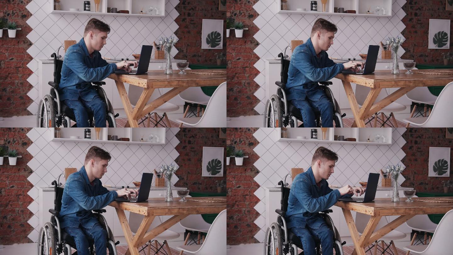 坐轮椅的年轻人在家里电脑
