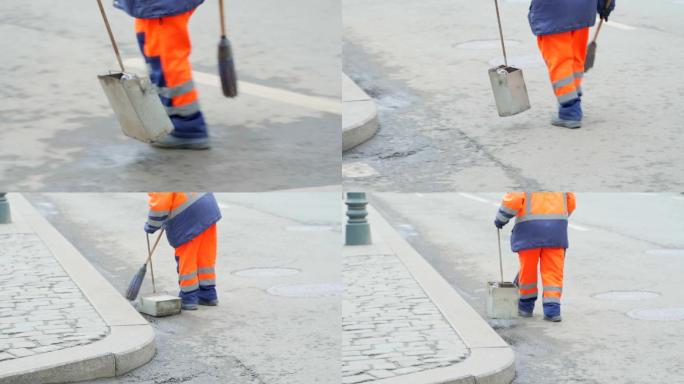 环卫工人清扫街道打扫路面环卫工