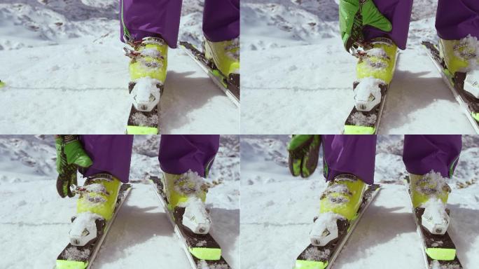 女滑雪者关闭靴扣