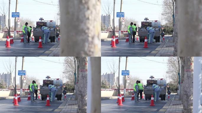 公路 修路 工人 施工 电钻