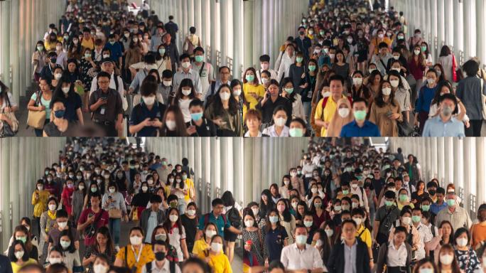 在曼谷，人们戴着口罩预防冠状病毒。
