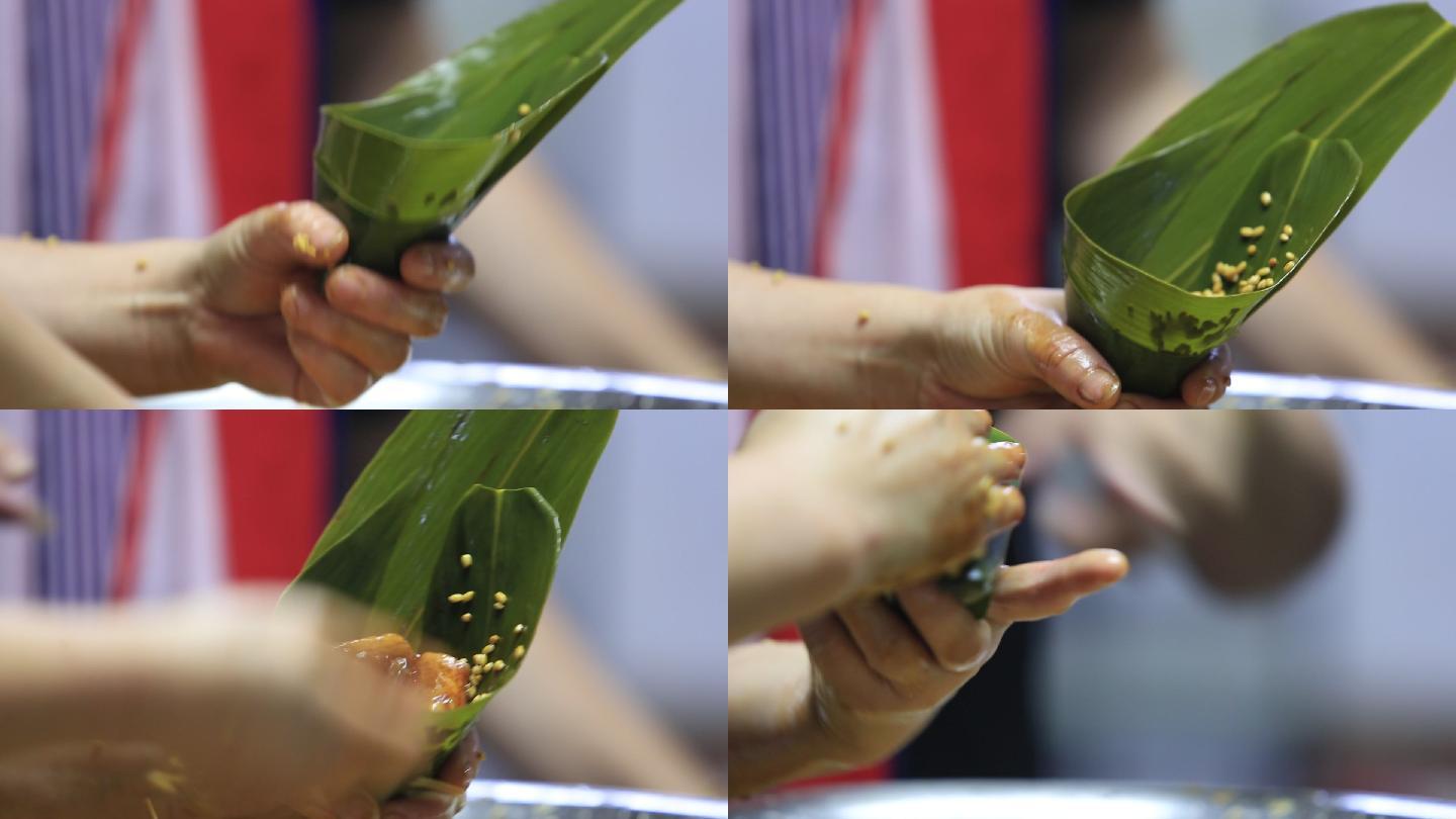 江南浙江绍兴端午节妈妈包粽子特写素材