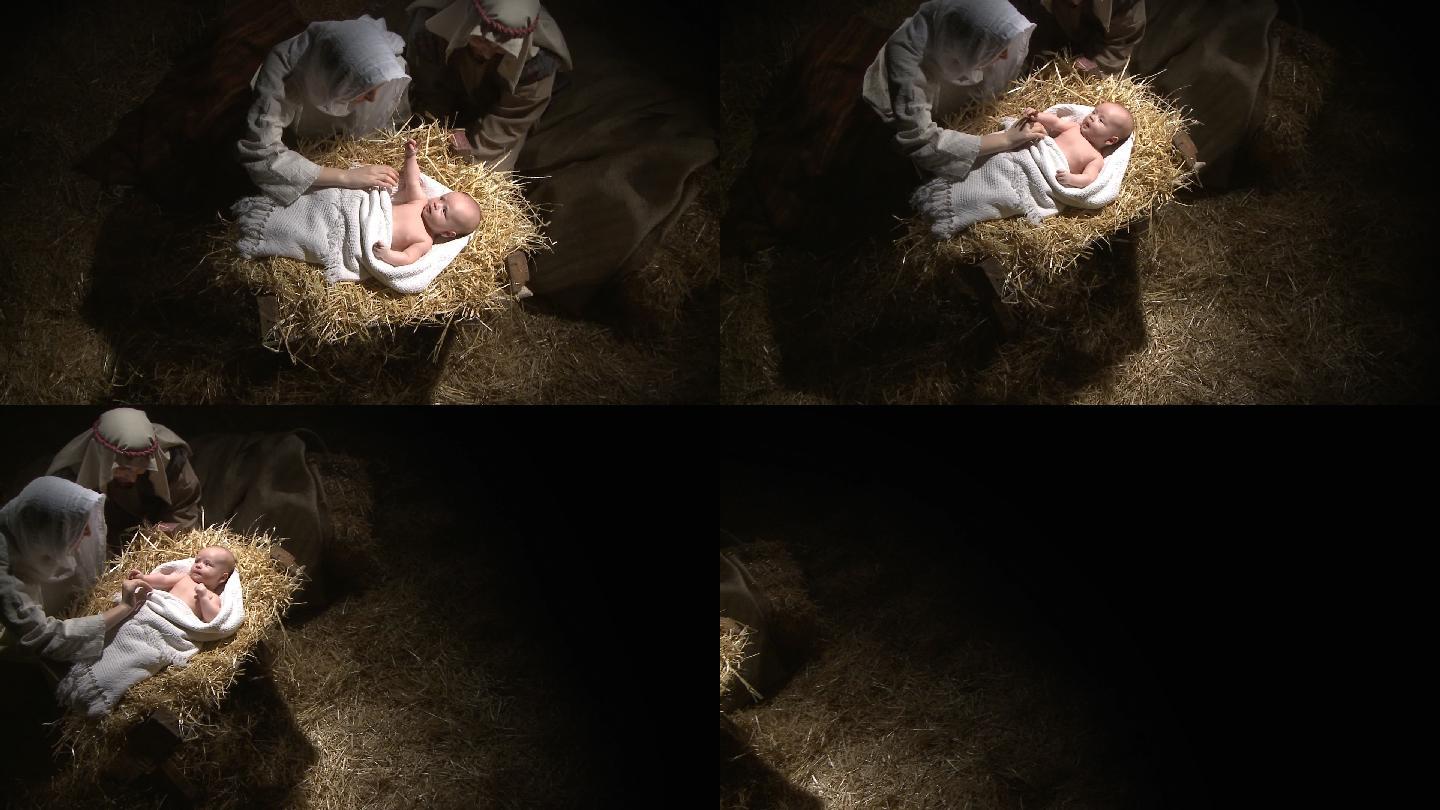 婴儿耶稣与玛丽和约瑟夫的头顶照片