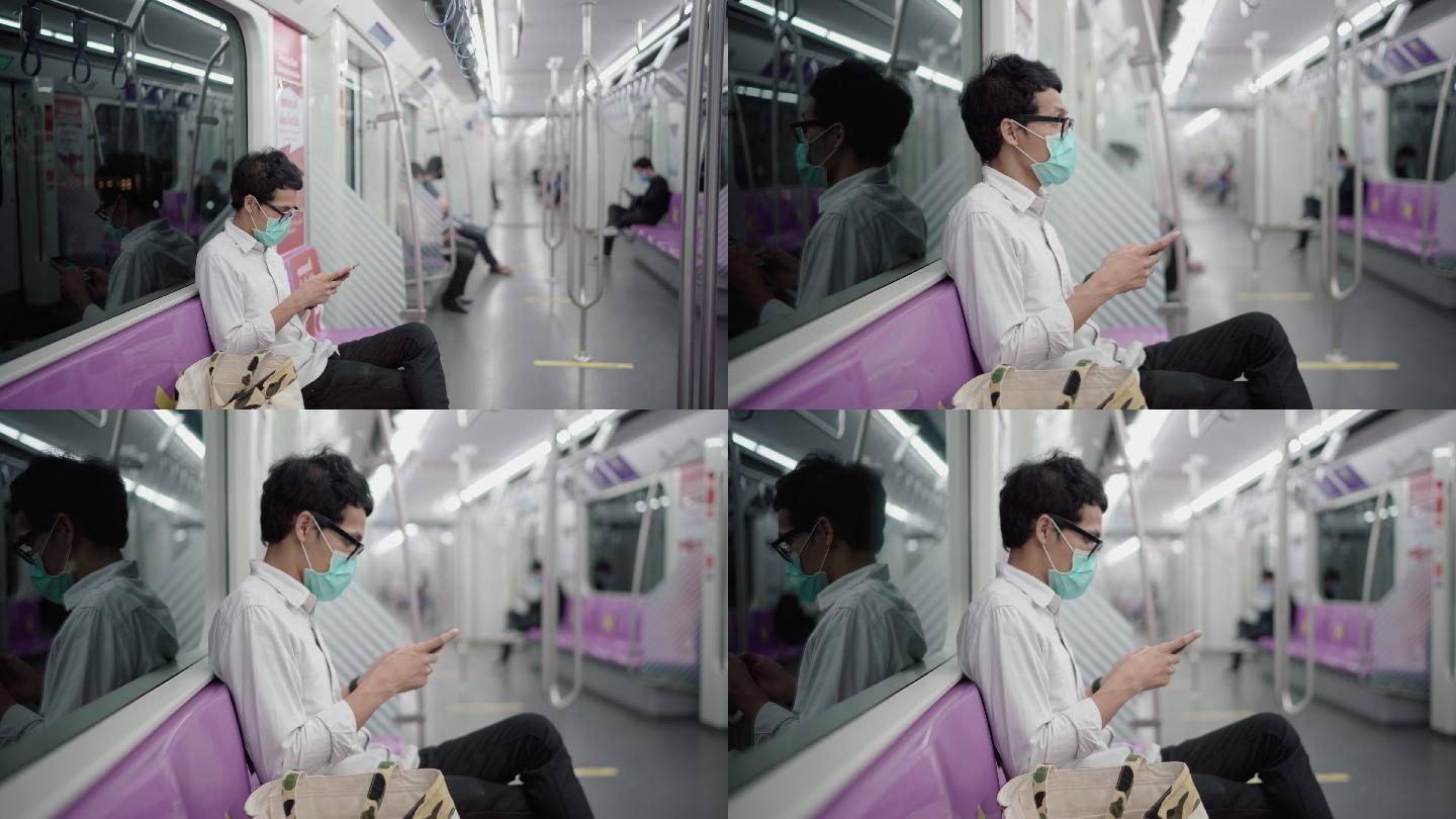 一名男子戴口罩乘坐地铁