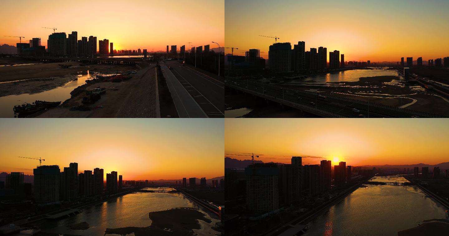 航拍青岛城市剪影，夕阳下的风河