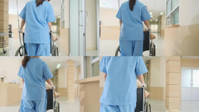 护士推在轮椅上老年患者穿过医院走廊