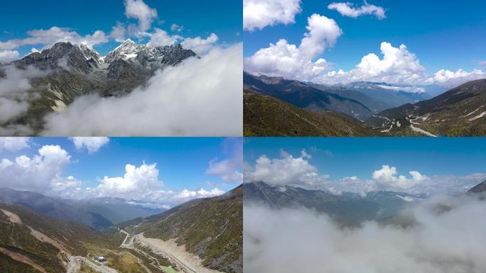 川西高原雪山蓝天白云雪山之巅山峰高山航拍