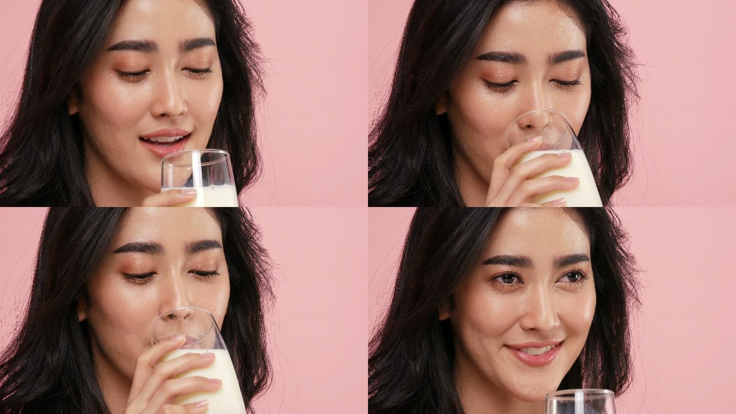 女子正在享用新鲜牛奶