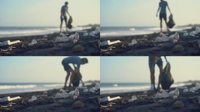 年轻人清理海滩垃圾